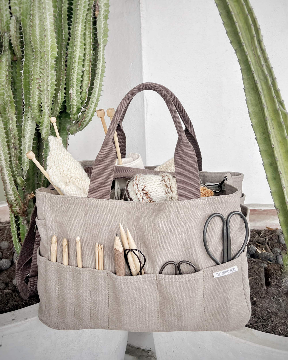 Paperbark light brown Artist Bag diagonal view, canvas artist supply bag with multiple exterior pockets and tall interior pockets for makers in Australia.